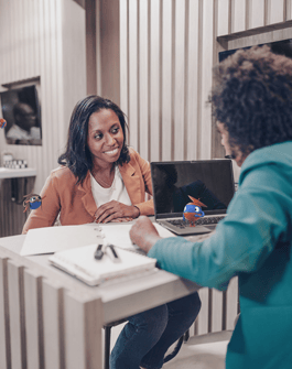 woman sitting at desk